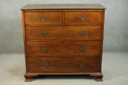A Victorian walnut and line inlaid chest of two short over three long drawers, on ogee feet. H.115