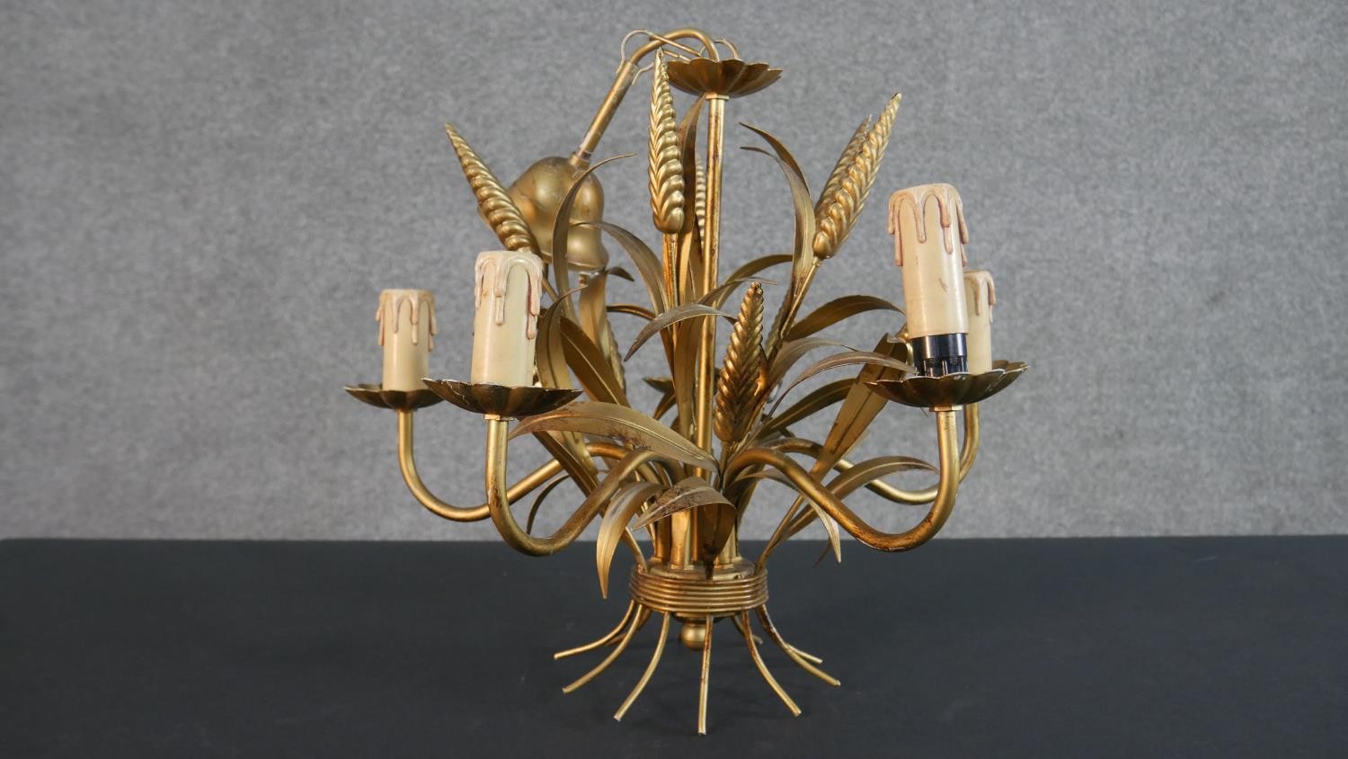 A 20th century gilt metal chandelier, in the form of a wheatsheaf, with five branches. H.48 W.43cm