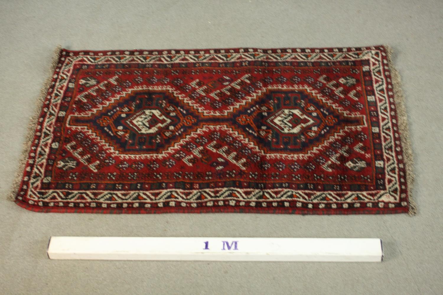 A hand made red ground Shiraz rug. L.130 W.82cm. - Image 2 of 6