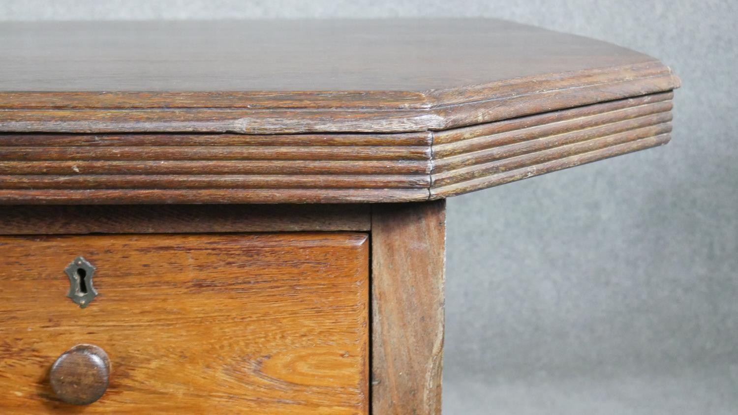 A vintage pedestal desk, the rectangular top with canted corners and a reeded edge, both pedestals - Image 7 of 7