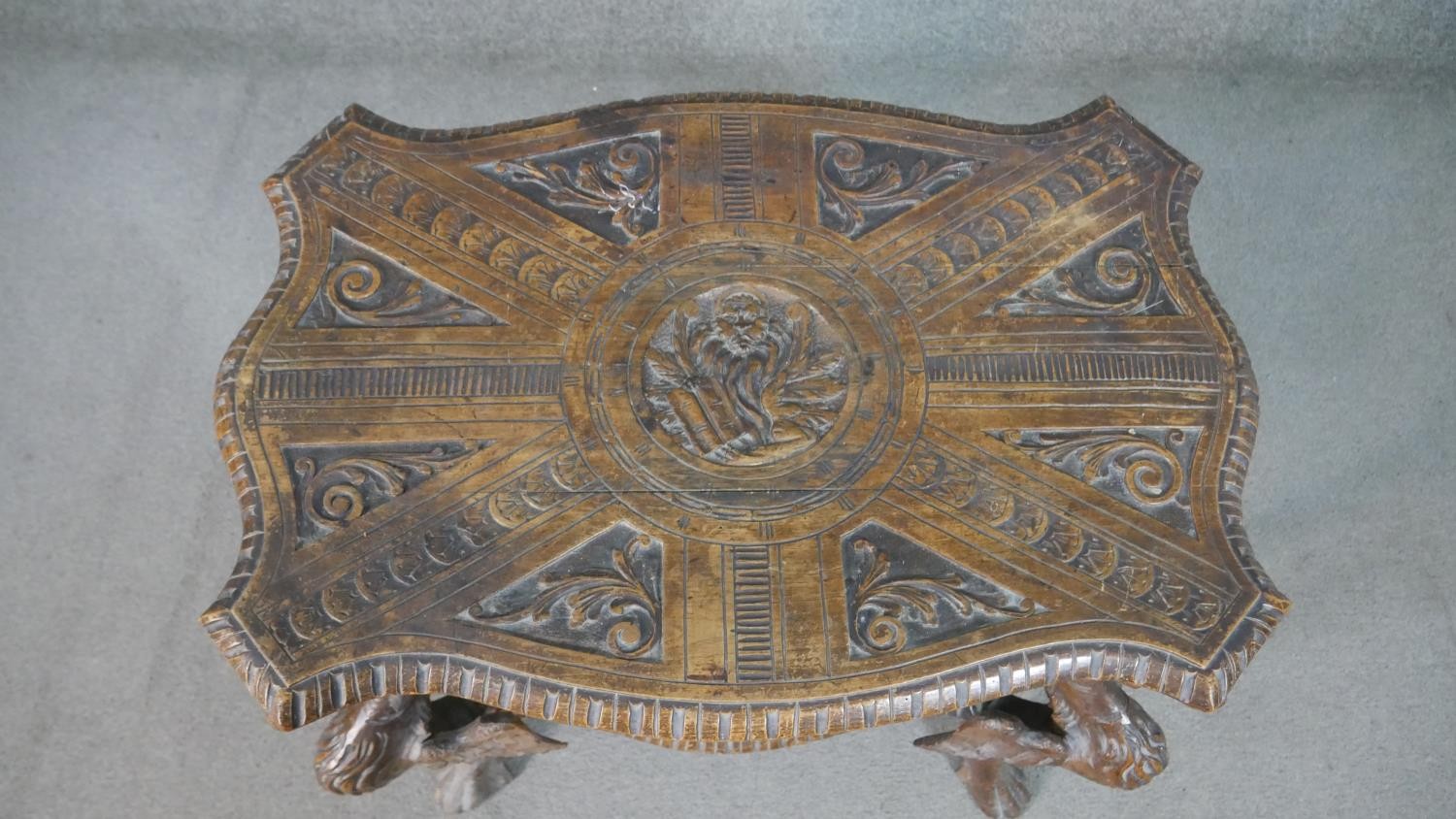 A late 19th century oak occasional table with shaped and carved central medallion raised on - Image 2 of 14