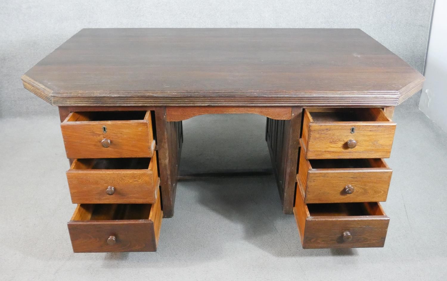A vintage pedestal desk, the rectangular top with canted corners and a reeded edge, both pedestals - Image 4 of 7