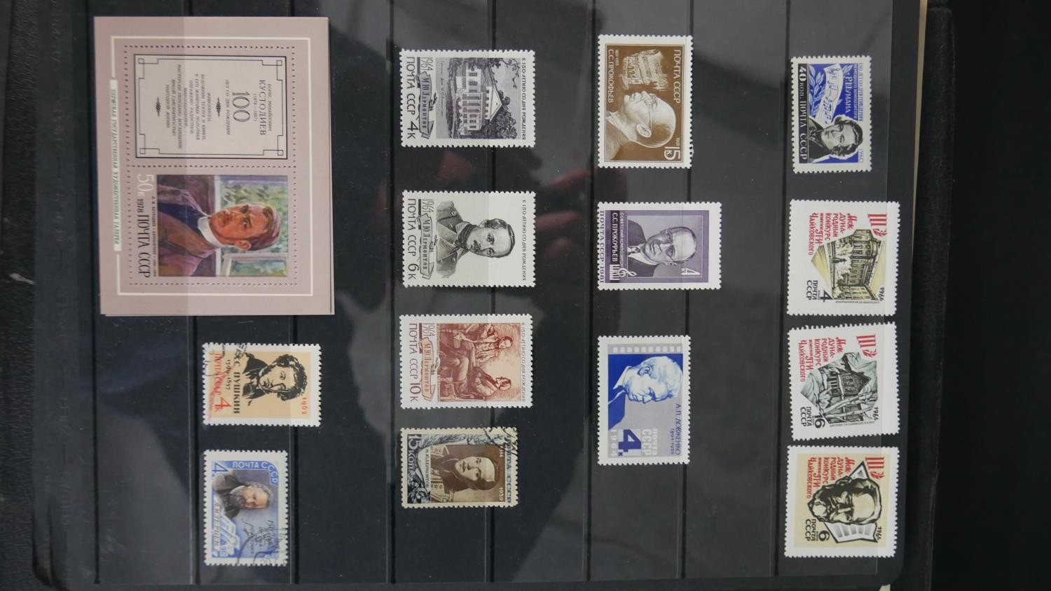 An album of world stamps along with a British Collecta coin album filled with various British coins. - Image 4 of 15