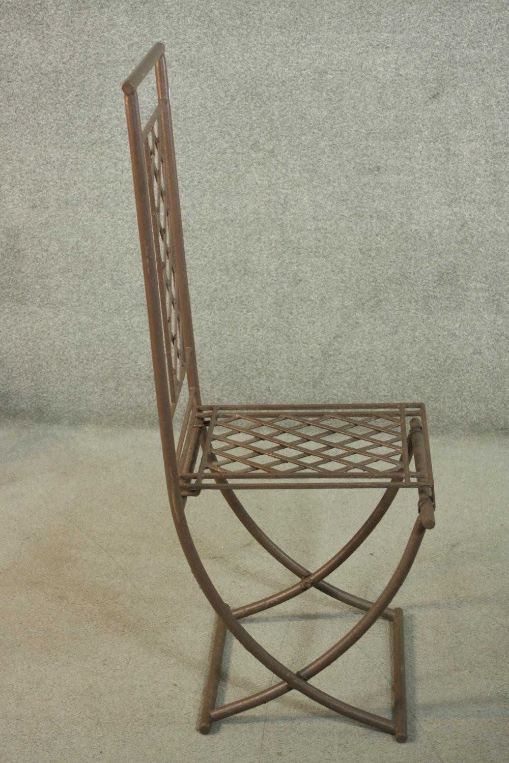 A set of four wrought iron folding garden dining chairs, with lattice back and seat. - Image 6 of 8