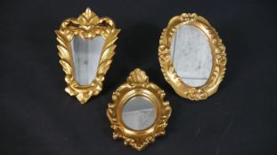 Three gilded gilt wood and gesso framed mirrors with foliate design. H.19 W.14cm (largest)