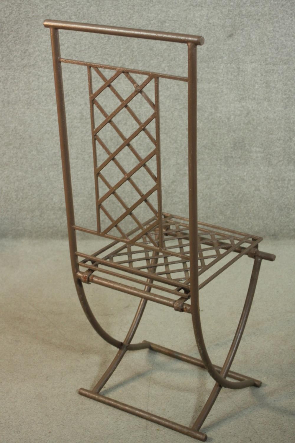 A set of four wrought iron folding garden dining chairs, with lattice back and seat. - Image 7 of 8