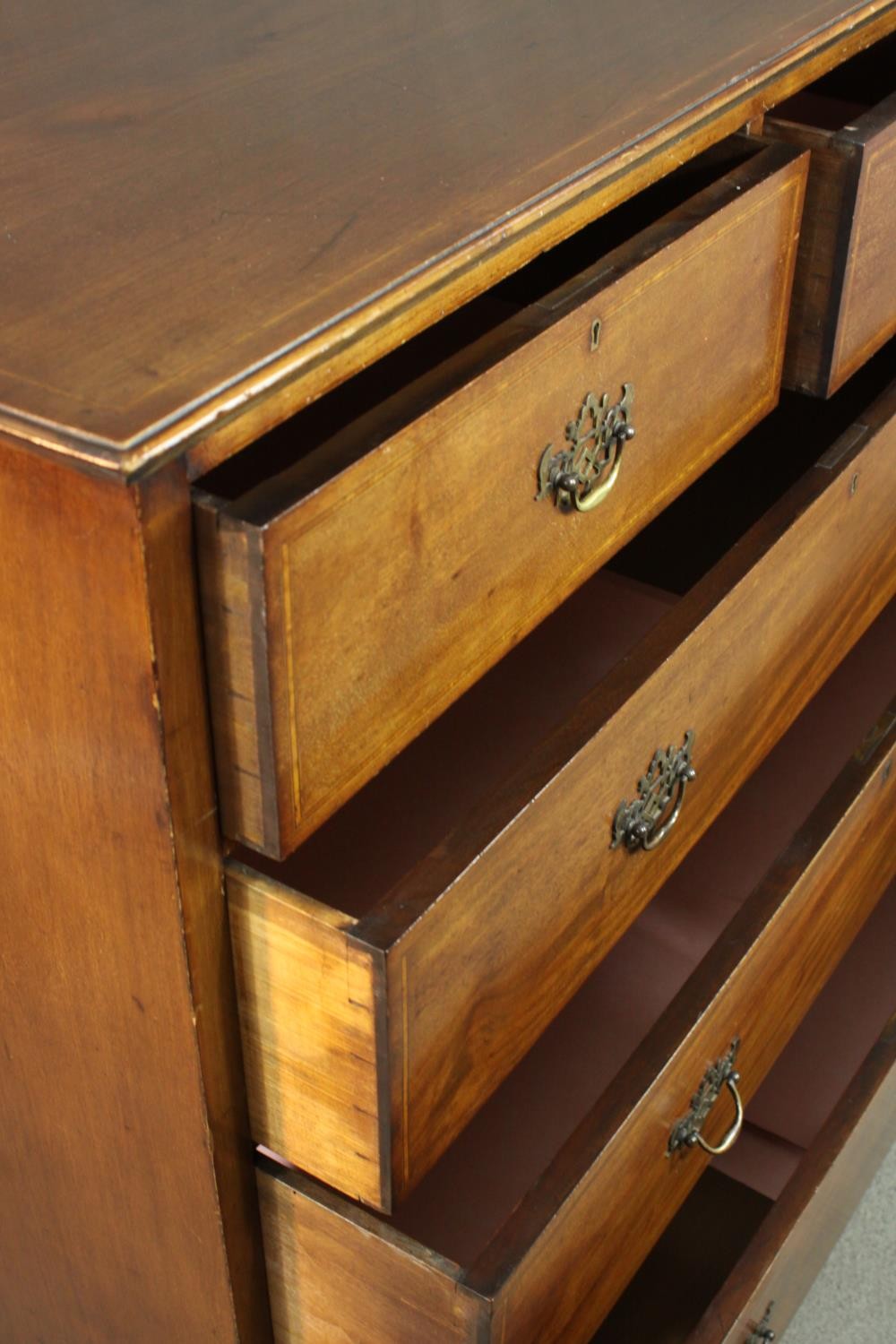 A Victorian walnut and line inlaid chest of two short over three long drawers, on ogee feet. H.115 - Image 9 of 9