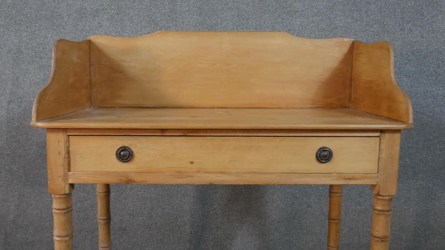 A Victorian pine washstand with raised back and frieze drawer on tapering turned supports. H.47 W.90 - Image 6 of 8