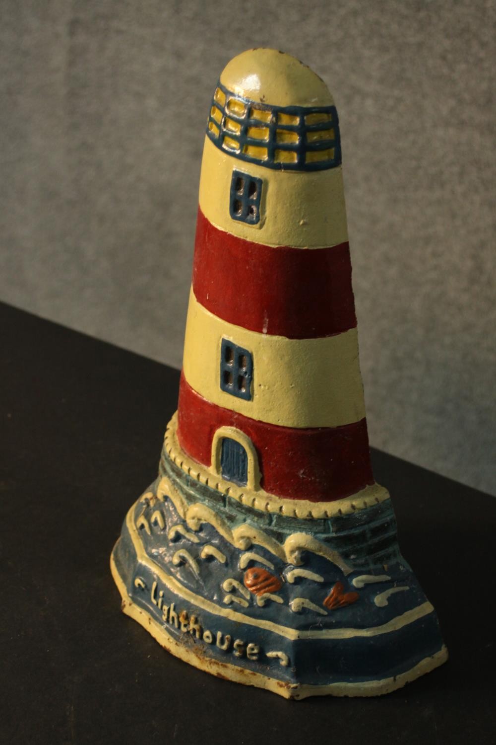A painted cast iron door stop in the form of a lighthouse. H.34 W.23cm. - Image 3 of 4