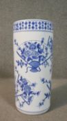 A 20th century Chinese blue and white ceramic umbrella stand with Oriental fan and flower design.