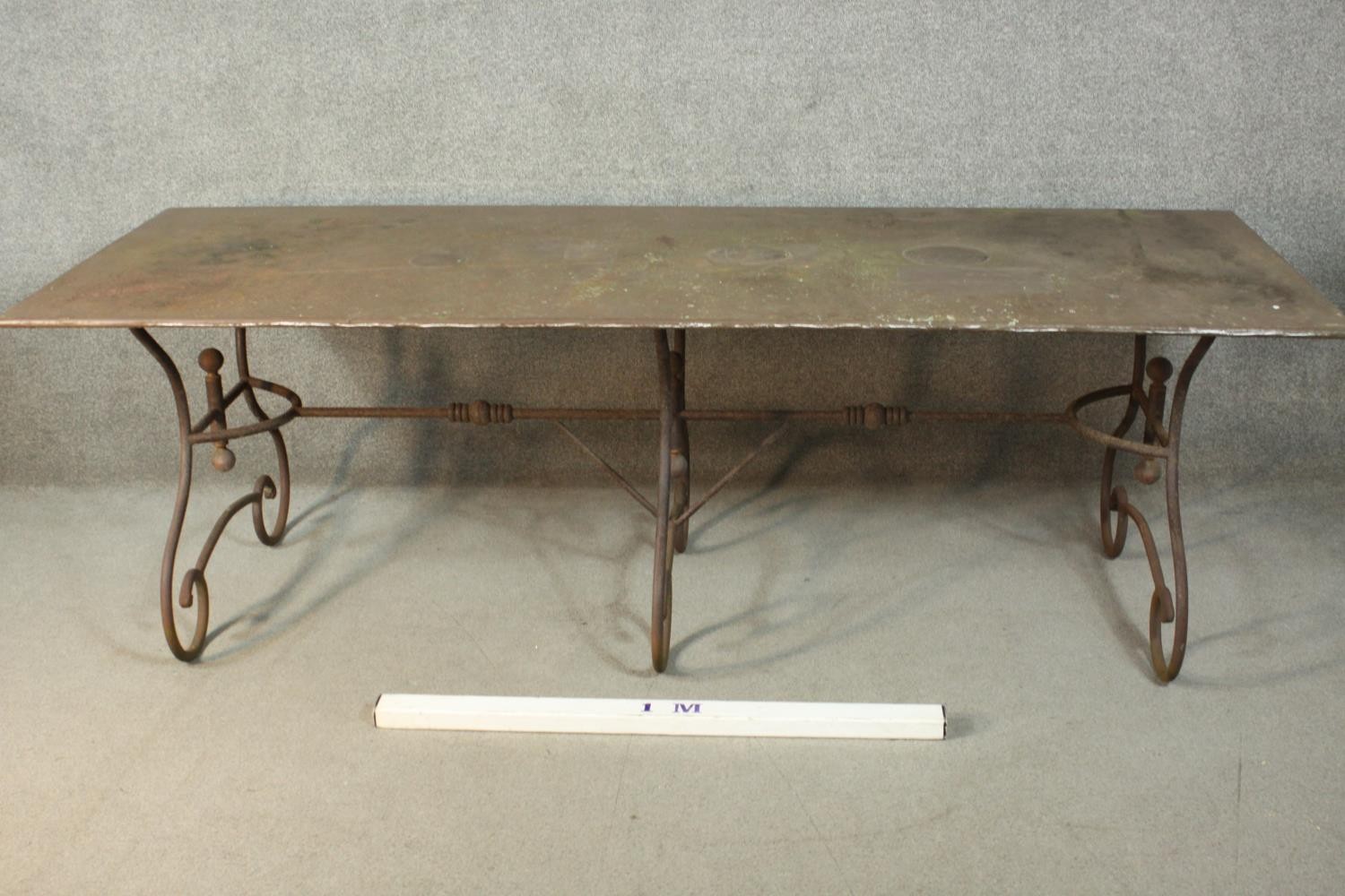 A French wrought iron table, possibly a baker's table, with a rectangular metal top, on scrolling - Image 2 of 8