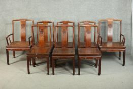 A set of eight late 20th century Chinese rosewood dining chairs including two carvers and six side