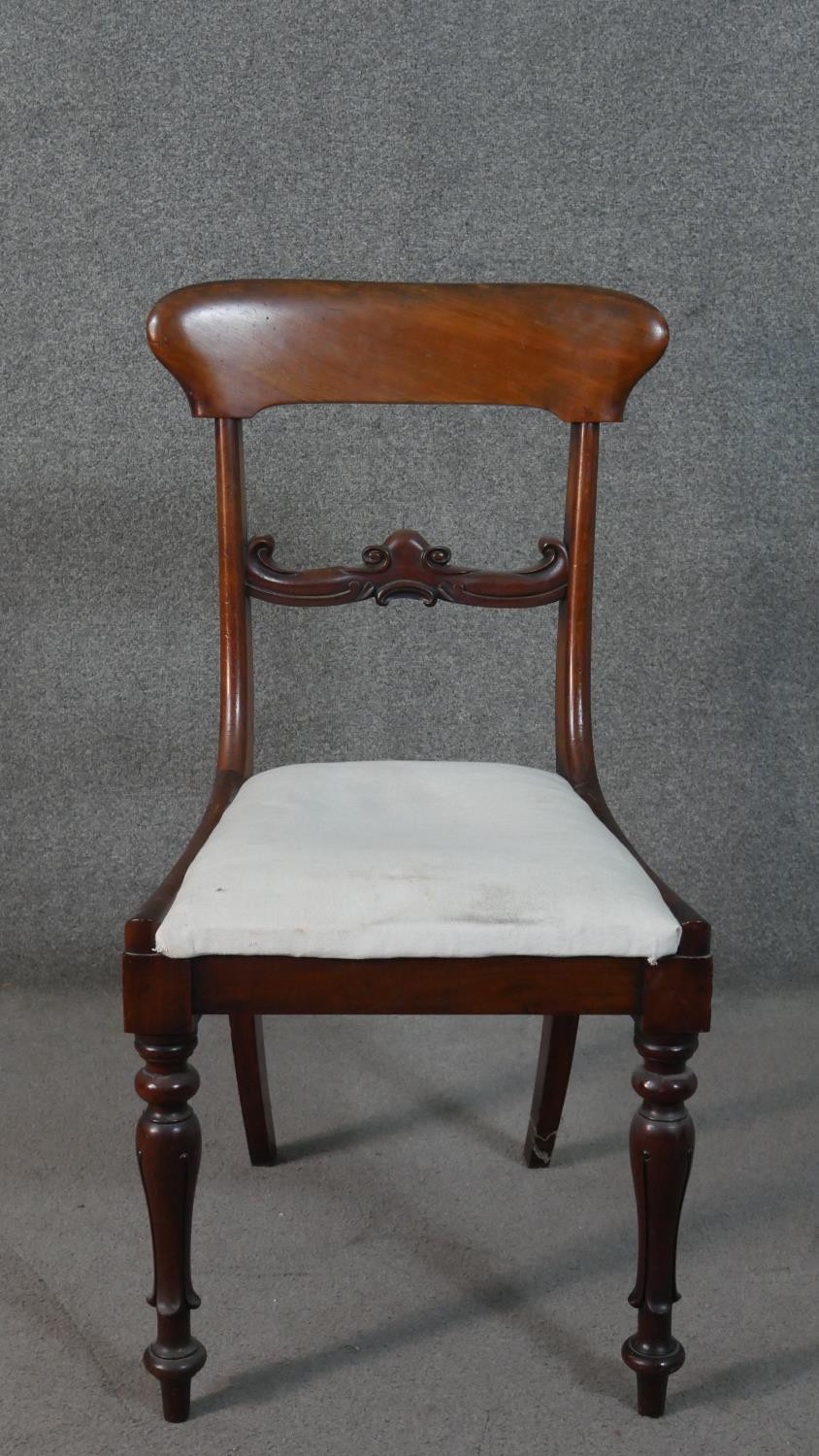 A set of four mid Victorian mahogany bar back dining chairs with drop in seats above turned tapering - Image 6 of 10