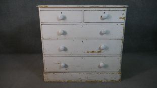A Victorian painted pine chest of drawers on plinth base. H.97 W.103 D.49cm (In need of some