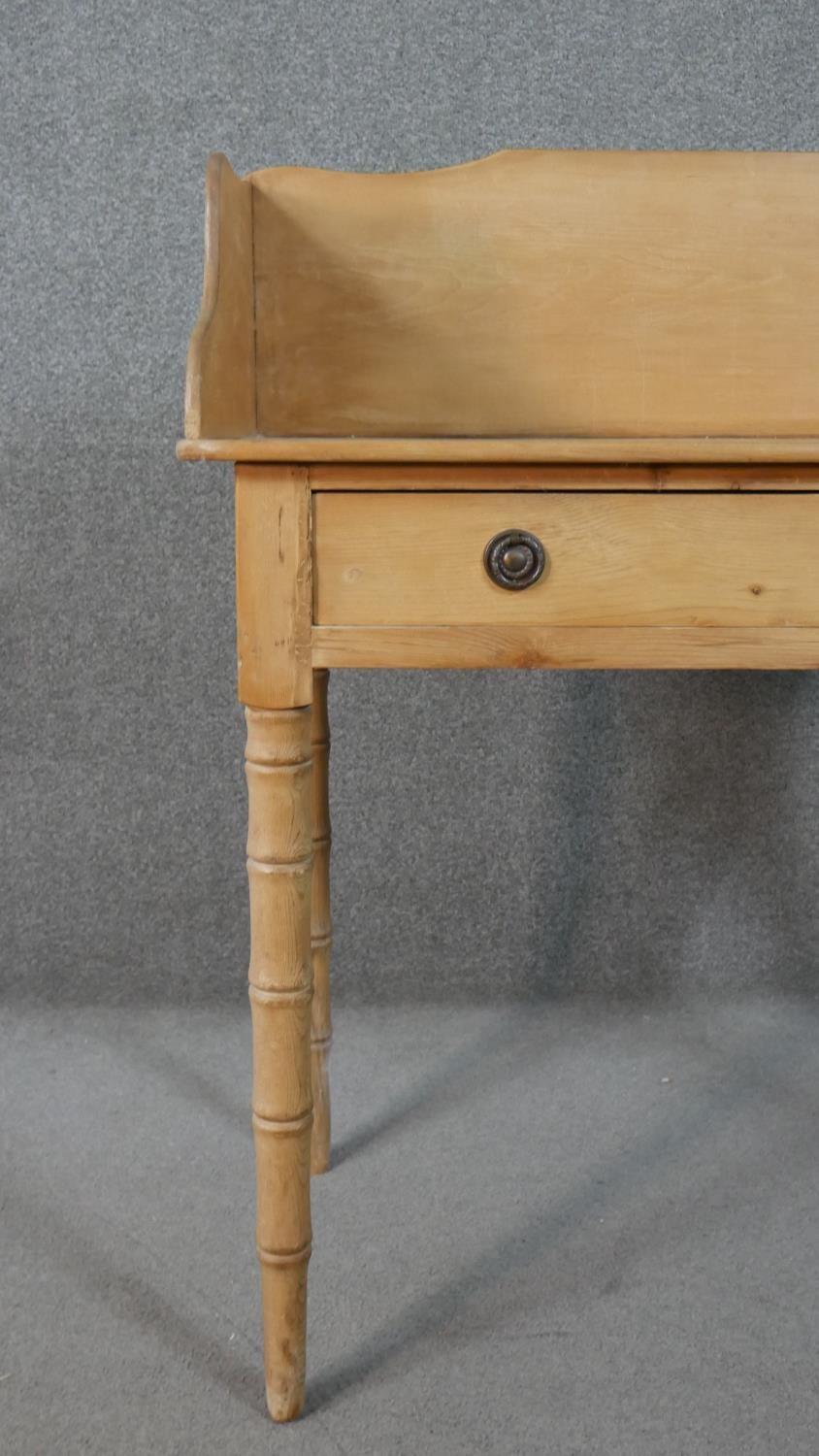 A Victorian pine washstand with raised back and frieze drawer on tapering turned supports. H.47 W.90 - Image 7 of 8