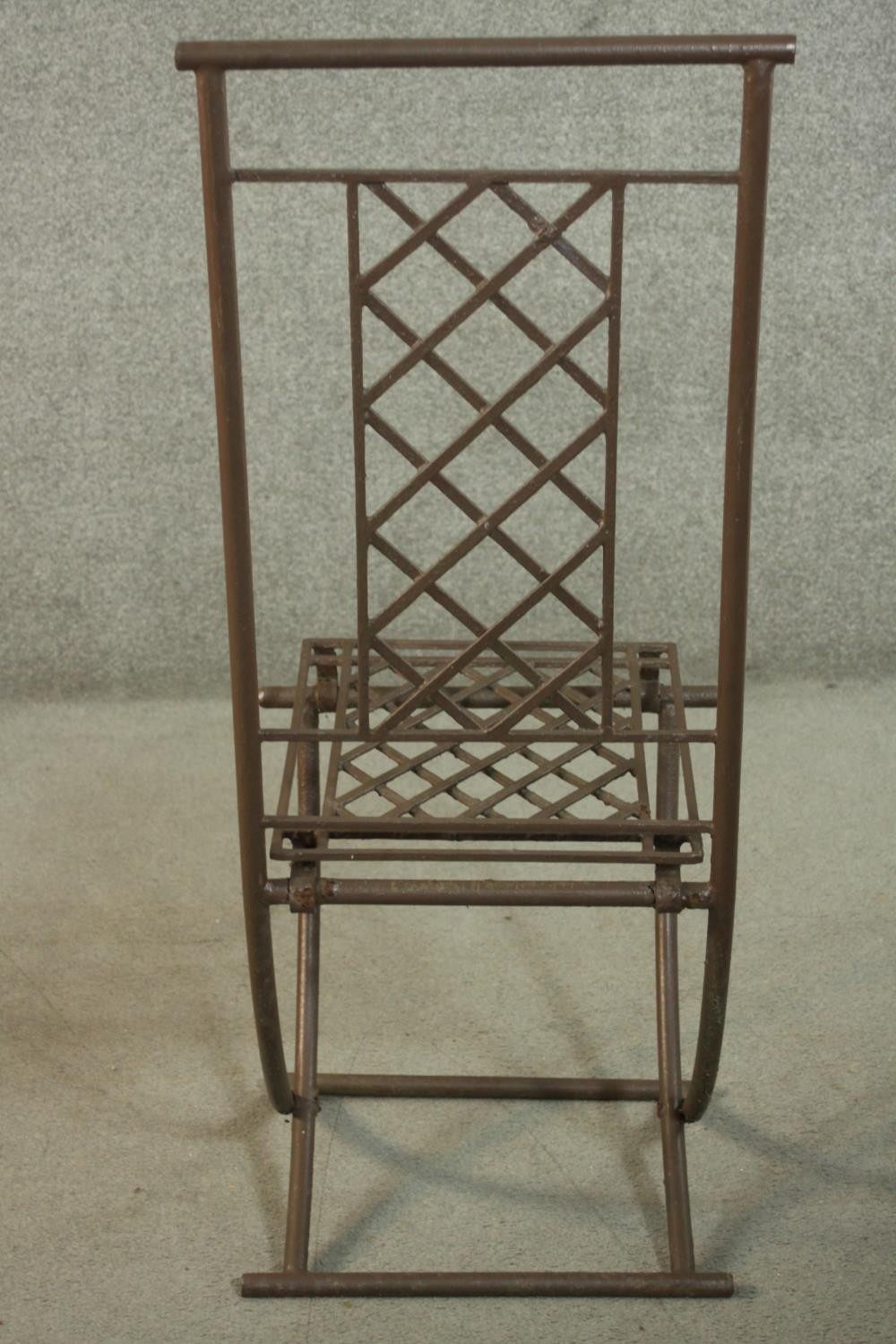A set of four wrought iron folding garden dining chairs, with lattice back and seat. - Image 8 of 8