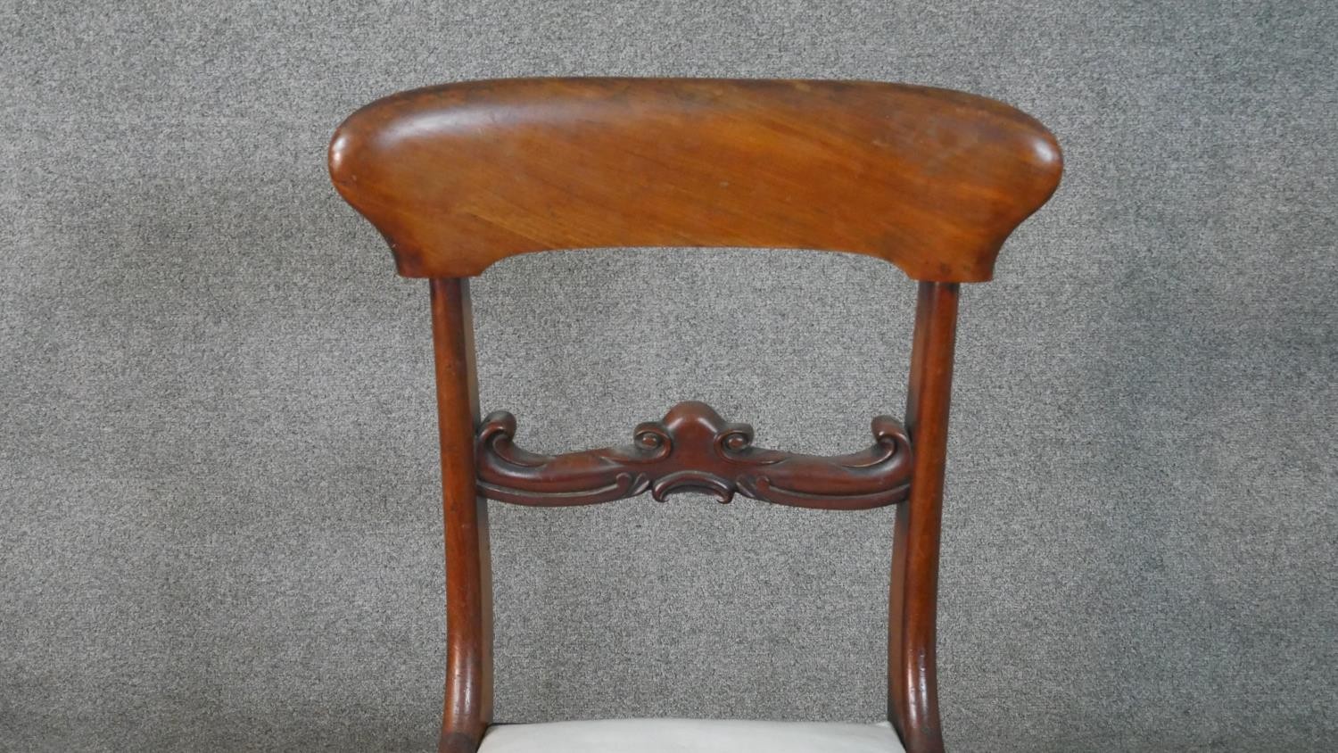 A set of four mid Victorian mahogany bar back dining chairs with drop in seats above turned tapering - Image 8 of 10