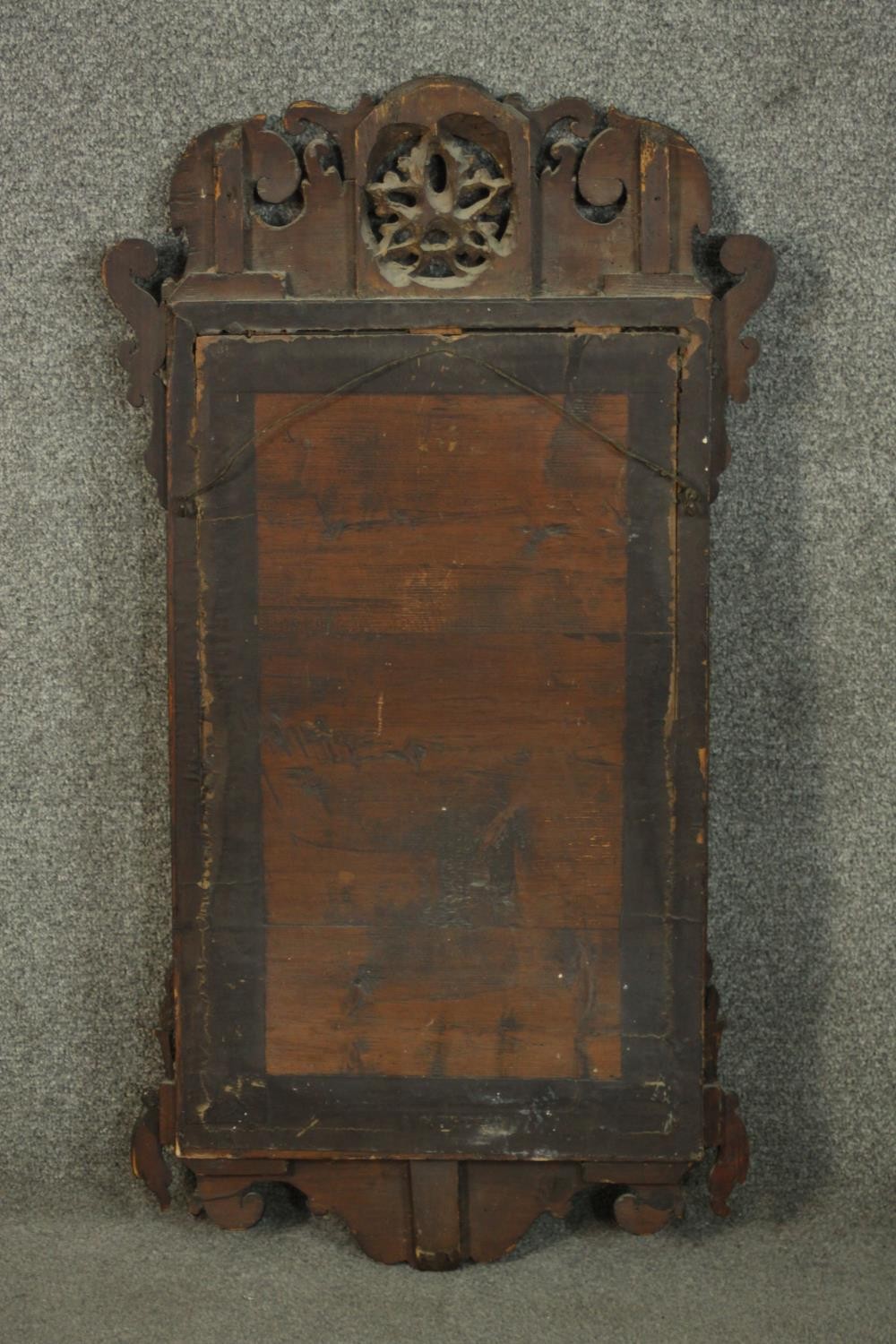 A George III parcel gilt mahogany fretwork mirror, with a carved and pierced stylised leaf over a - Image 5 of 5