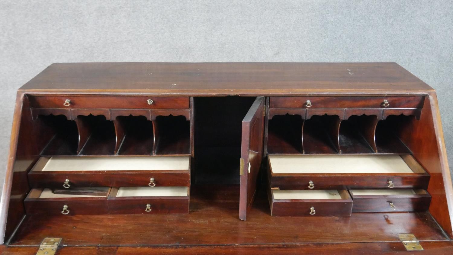 A George III mahogany bureau, the fall front opening to reveal a central cupboard door, drawers - Image 6 of 14