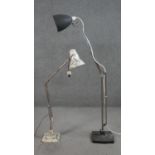 Two vintage Herbert Terry anglepoise desk lamps. One painted white and the other with a black base
