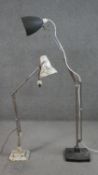 Two vintage Herbert Terry anglepoise desk lamps. One painted white and the other with a black base