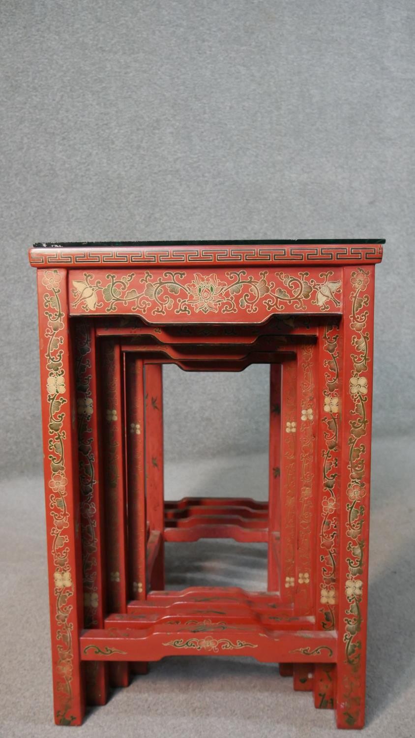 A quartetto of Chinese red lacquered occasional tables, of rectangular form, painted with figures in - Image 11 of 11