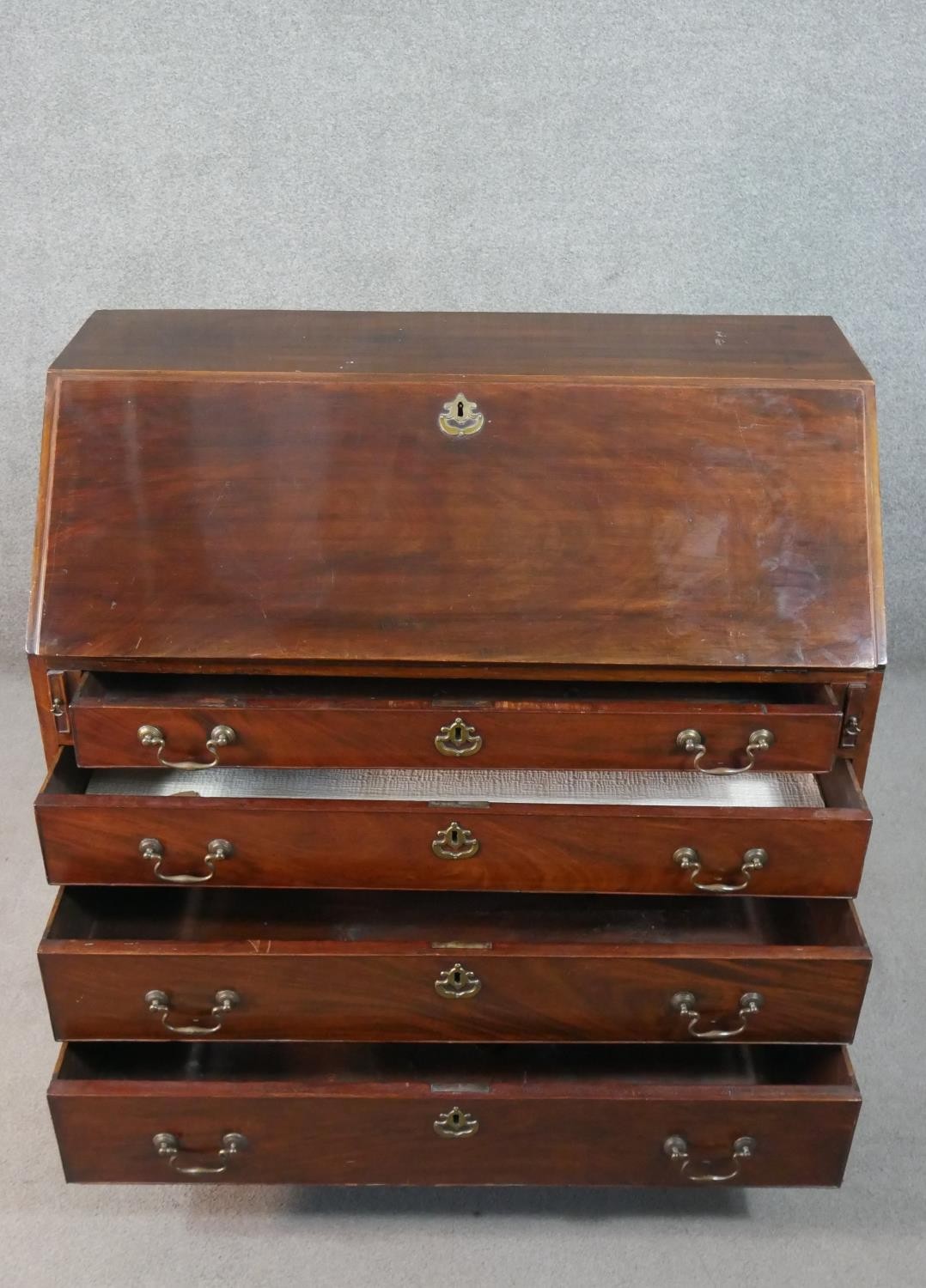 A George III mahogany bureau, the fall front opening to reveal a central cupboard door, drawers - Image 2 of 14
