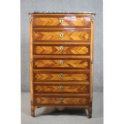 A French marble topped crossbanded and herringbone inlaid kingwood tall boy chest of seven long