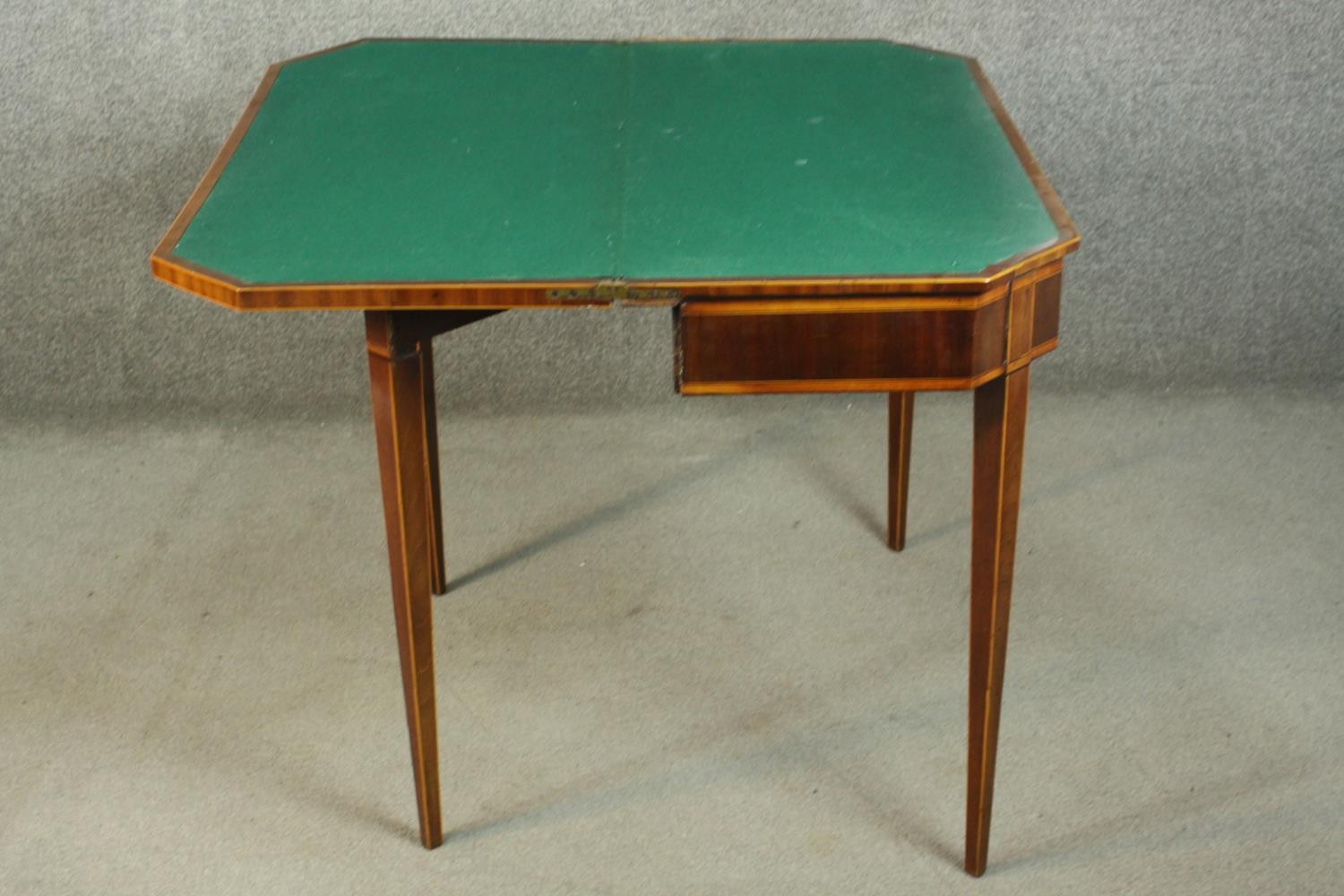 A Sheraton style mahogany card table, the rectangular top with canted corners, crossbanded with - Image 9 of 10