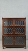A 20th century Minty of Oxford three tier stacking bookcase, each tier with two leaded glass