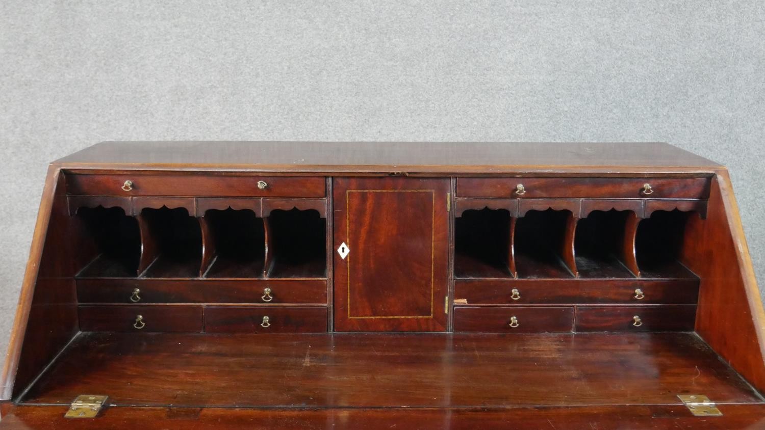 A George III mahogany bureau, the fall front opening to reveal a central cupboard door, drawers - Image 5 of 14