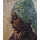 A framed oil on canvas portrait of a young boy in a turban, monogrammed ES. Gallery label verso. H.