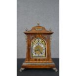 A Breton & Sons, Cork quarter striking walnut and gilt ormolu bracket clock. Gilded dial with silver