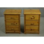 A pair of late 20th century pine bedside chests, of three drawers with knob handles. H.59 W.45 D.