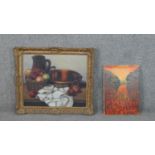 A framed oil on canvas of a still life, indistinctly inscribed verso along with an oil on board