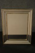 A contemporary mirror, of rectangular form, in a silvered and mirrored frame. H,50 W.40cm.