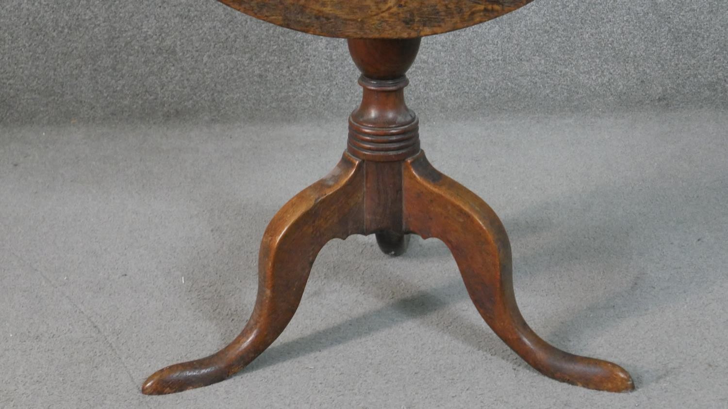 A 19th century country oak tilt top occasional table on tripod cabriole supports. H.72 Diam.71cm - Image 5 of 7