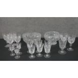 A large collection of cut crystal, including a set of six sherry glasses, four wine glasses and