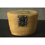 A Chinese lockable woven picnic basket containing blue and white tea pot and two tea bowls. H.20 W.
