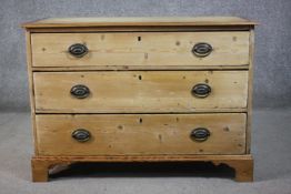 A Georgian pine chest of drawers on bracket feet. H.75 W.105 D.48cm.