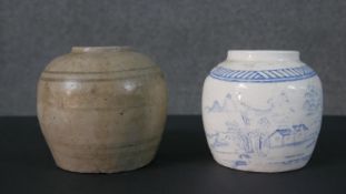 Two 19th century provincial Chinese ginger jars. The blue and white jar with a mountainous village