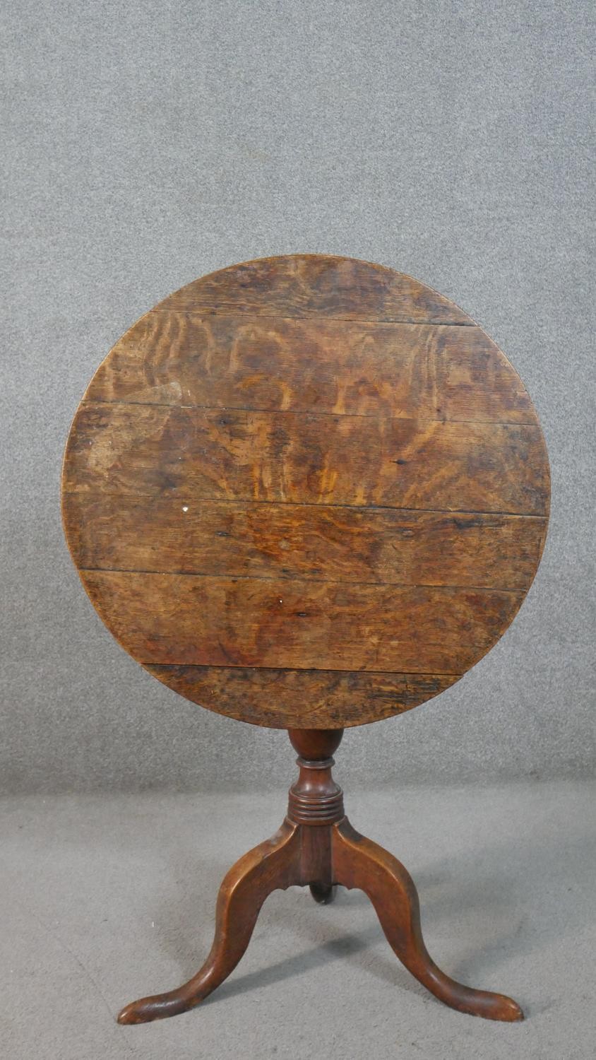 A 19th century country oak tilt top occasional table on tripod cabriole supports. H.72 Diam.71cm - Image 3 of 7