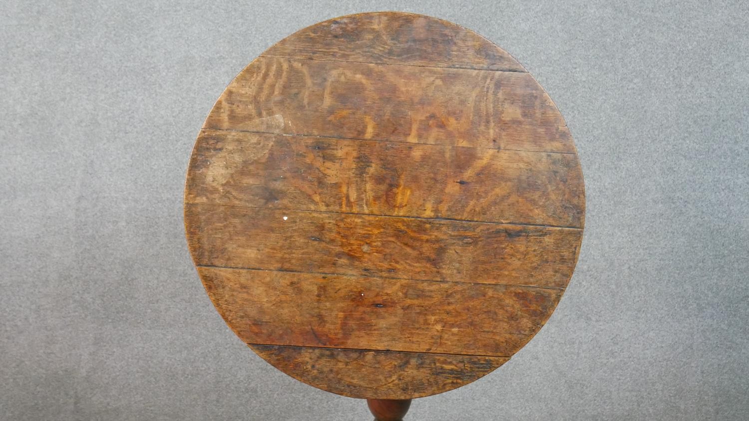 A 19th century country oak tilt top occasional table on tripod cabriole supports. H.72 Diam.71cm - Image 4 of 7