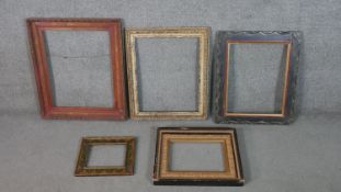 A collection of five painted and carved picture frames, some with gilded detailing. H.72 W.60cm. (