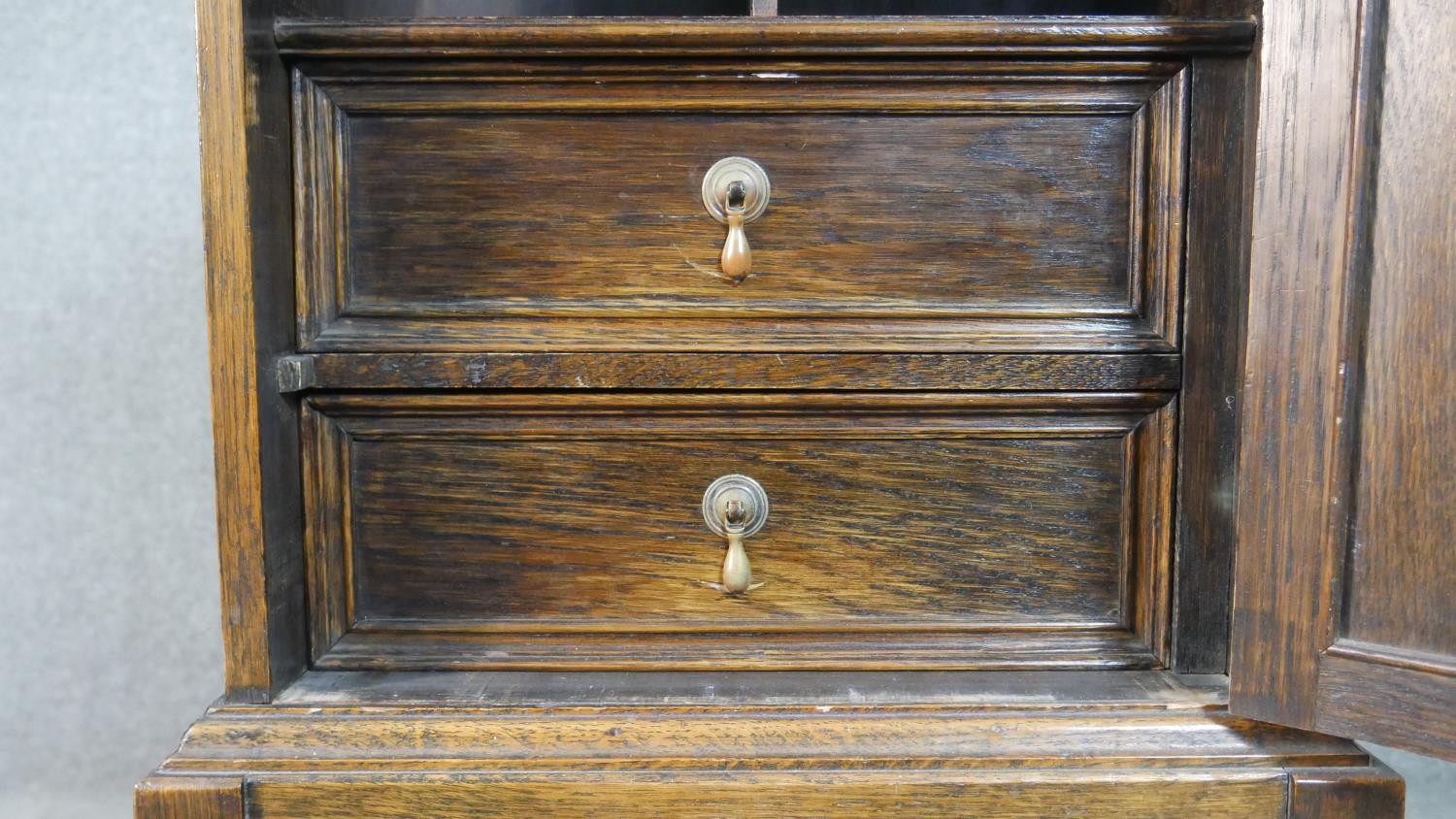 A Jacobean style oak cabinet with lozenge panel door enclosing a fitted interior on a barleytwist - Image 6 of 7