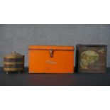 Two vintage tins and a 19th century copper and brass tea caddy. The orange painted cake tin with