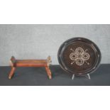 A 19th century Chinese bamboo folding travel head rest along with a carved plate inlaid with a
