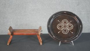 A 19th century Chinese bamboo folding travel head rest along with a carved plate inlaid with a
