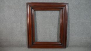 A large mahogany early 20th century picture frame. H.130 W.112cm (overall), H.98.5 W.79cm,(canvas