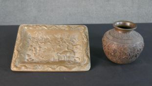 A Japanese cast brass tray, decorated with a dragon border and figural scene to the centre along